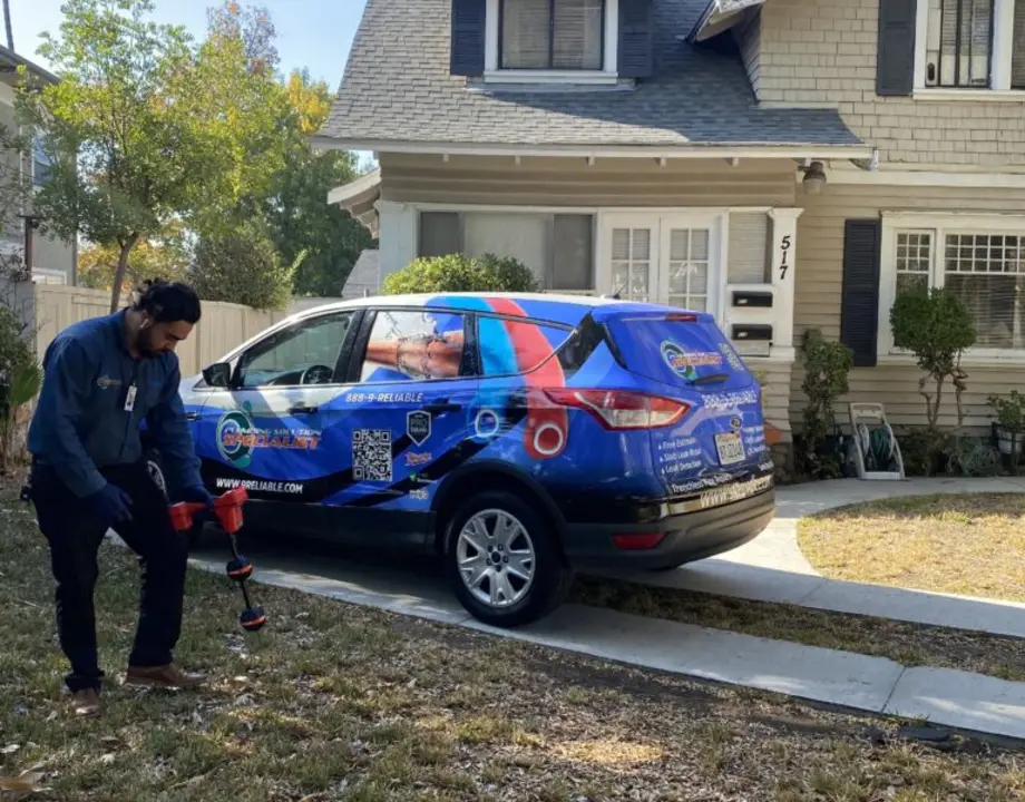 Plumbing Solution Specialist service vehicle and technician at a Southern California home